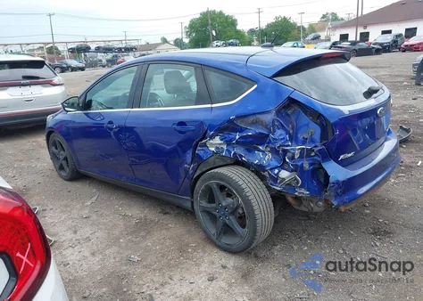 2012 Ford Focus Titanium z USA, uszkodzony, nr VIN 1FAHP3N24CL283473